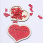 Preview: Holz Puzzle in Herzform, rot, mit Schriftzug "I love you"